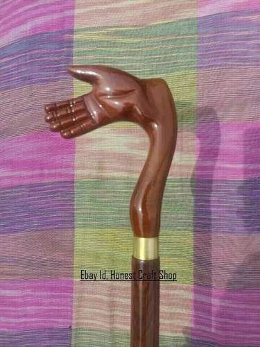 Wooden hand carved walking - hand,